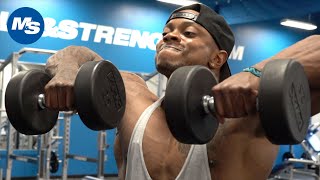 Quick Tip How to Perform Dumbbell Upright Rows [upl. by Naujaj]